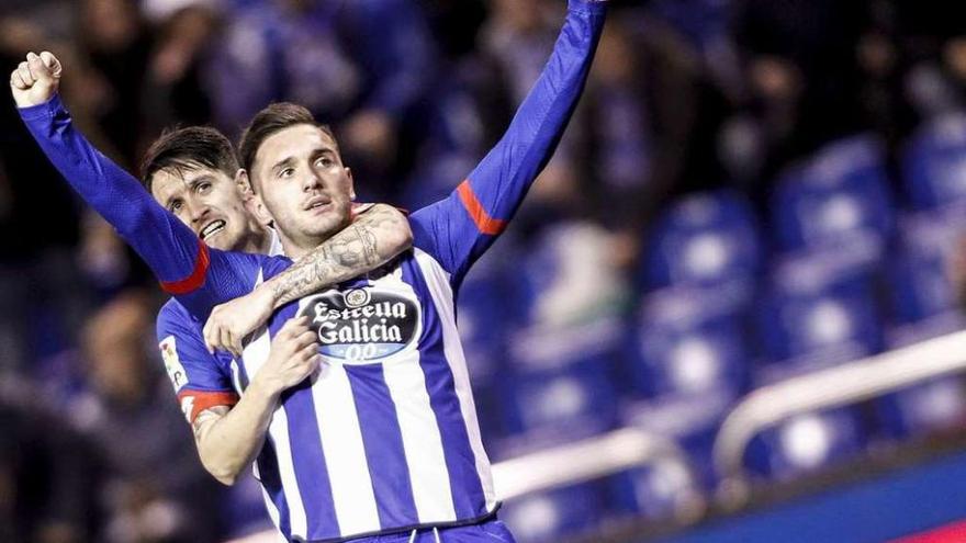 Lucas celebra con Luis Alberto su gol ante el Málaga del sábado.