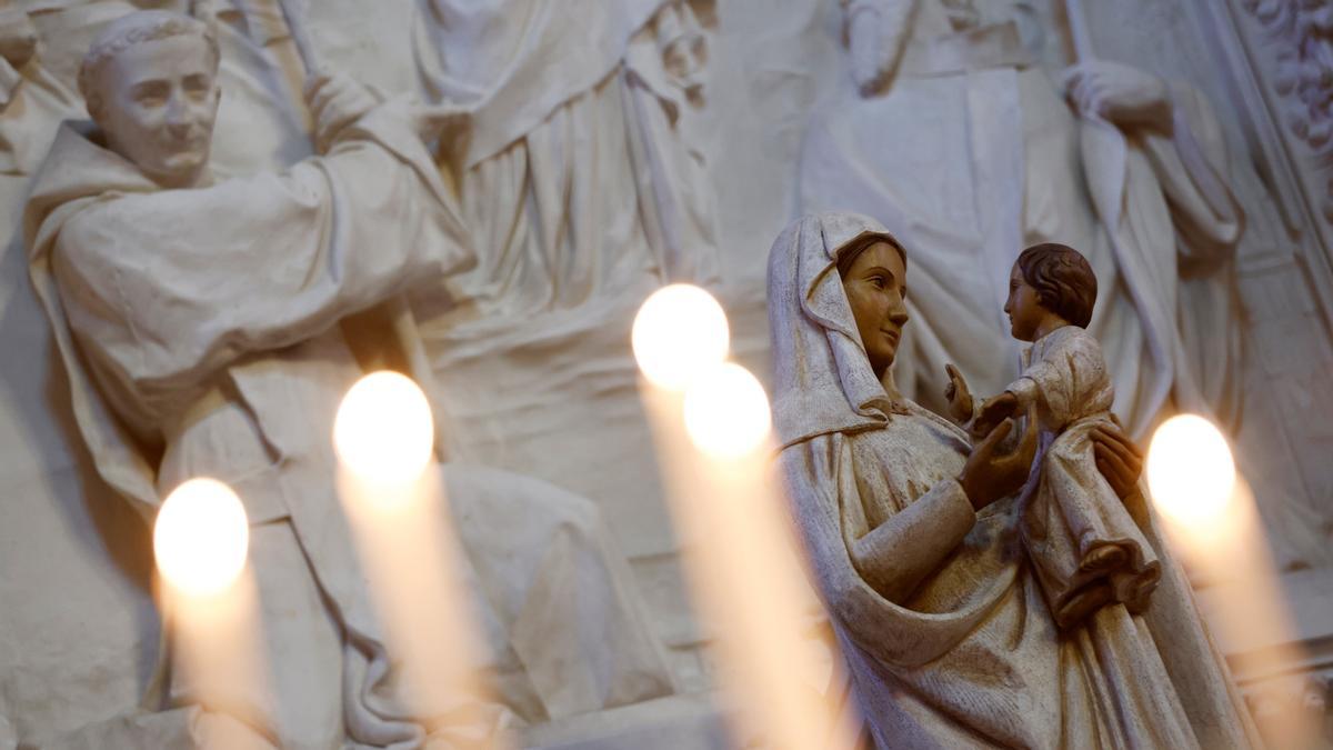 A statue of the Virgin Mary holding a child in her arms is pictured inside the Saint-Martin church in Vertou