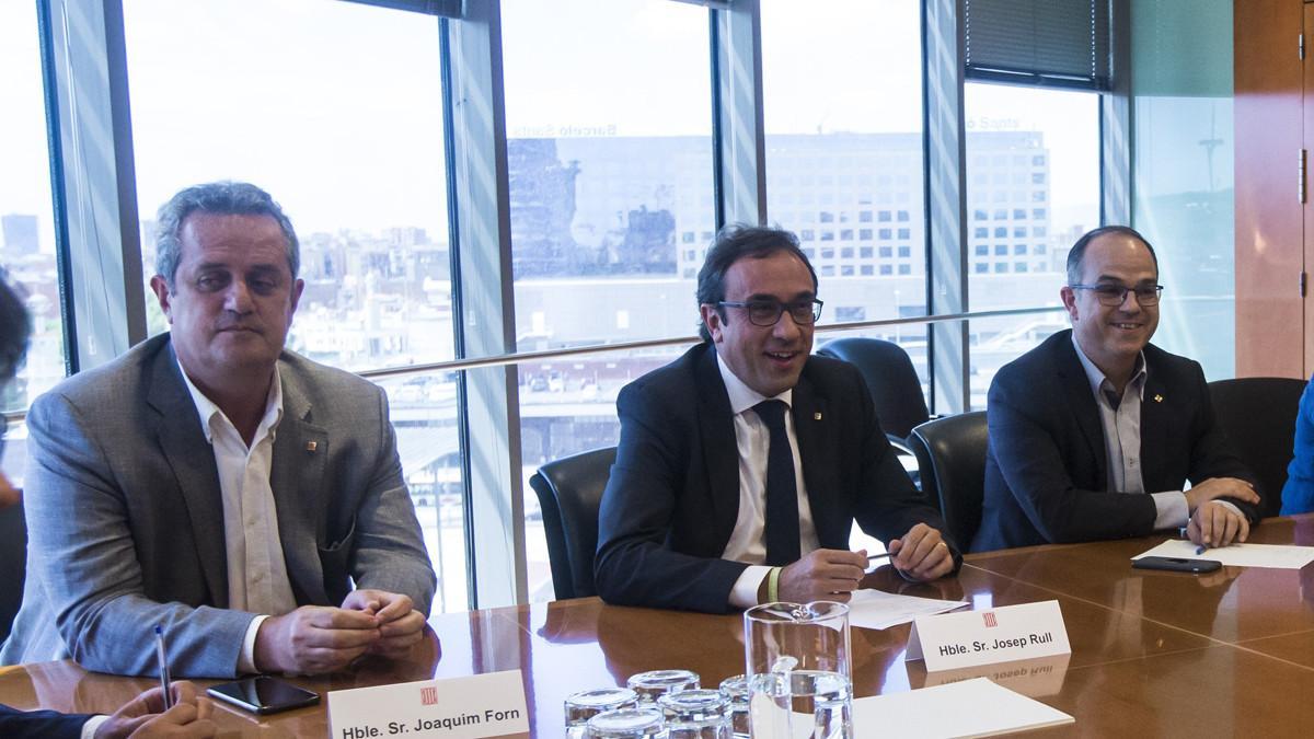 Joaquim Forn, Josep Rull y Jordi Turull, en una reunión