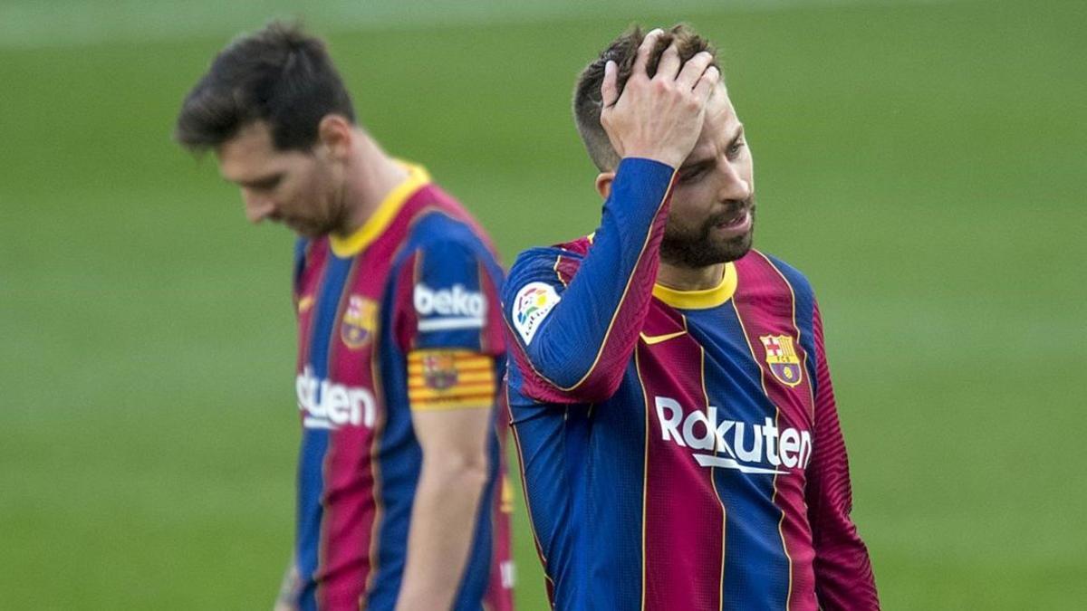 Leo Messi y Gerard Piqué, en el clásico.