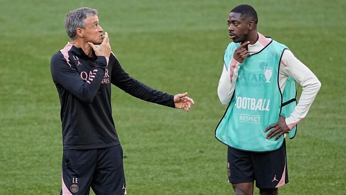 Luis Enrique y Dembélé intercambian impresiones antes de la final de la Champions de 2025
