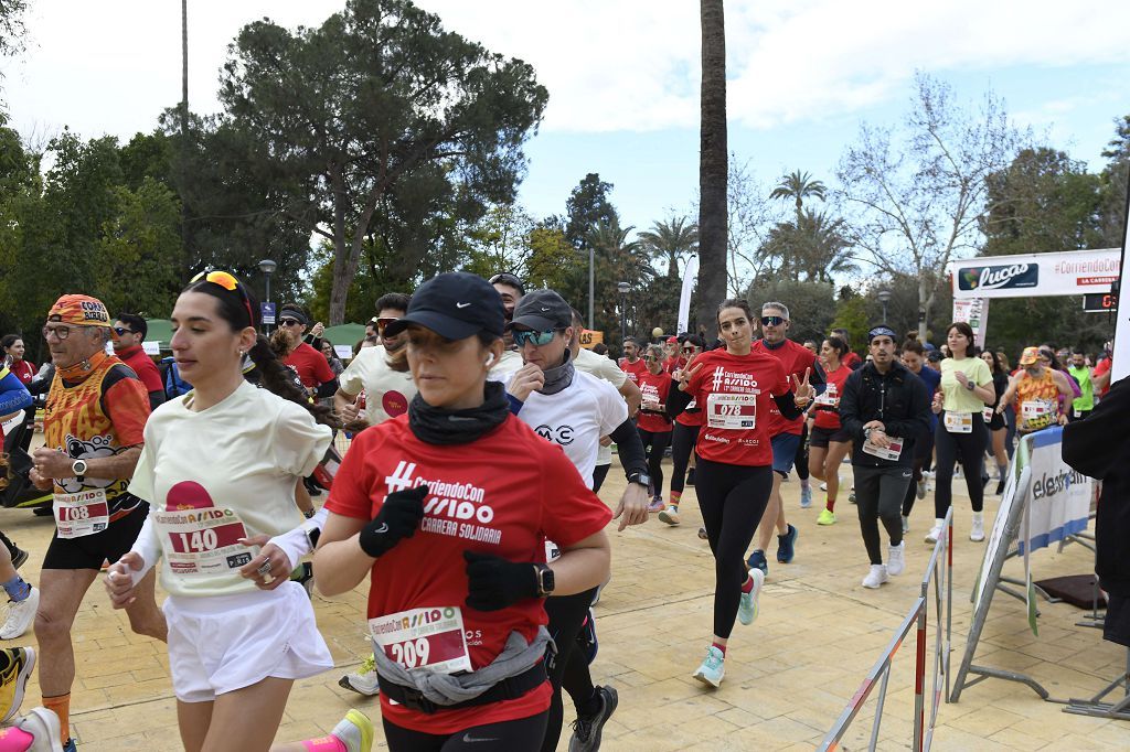 La XIII carrera solidaria Corriendo con Assido, en imágenes
