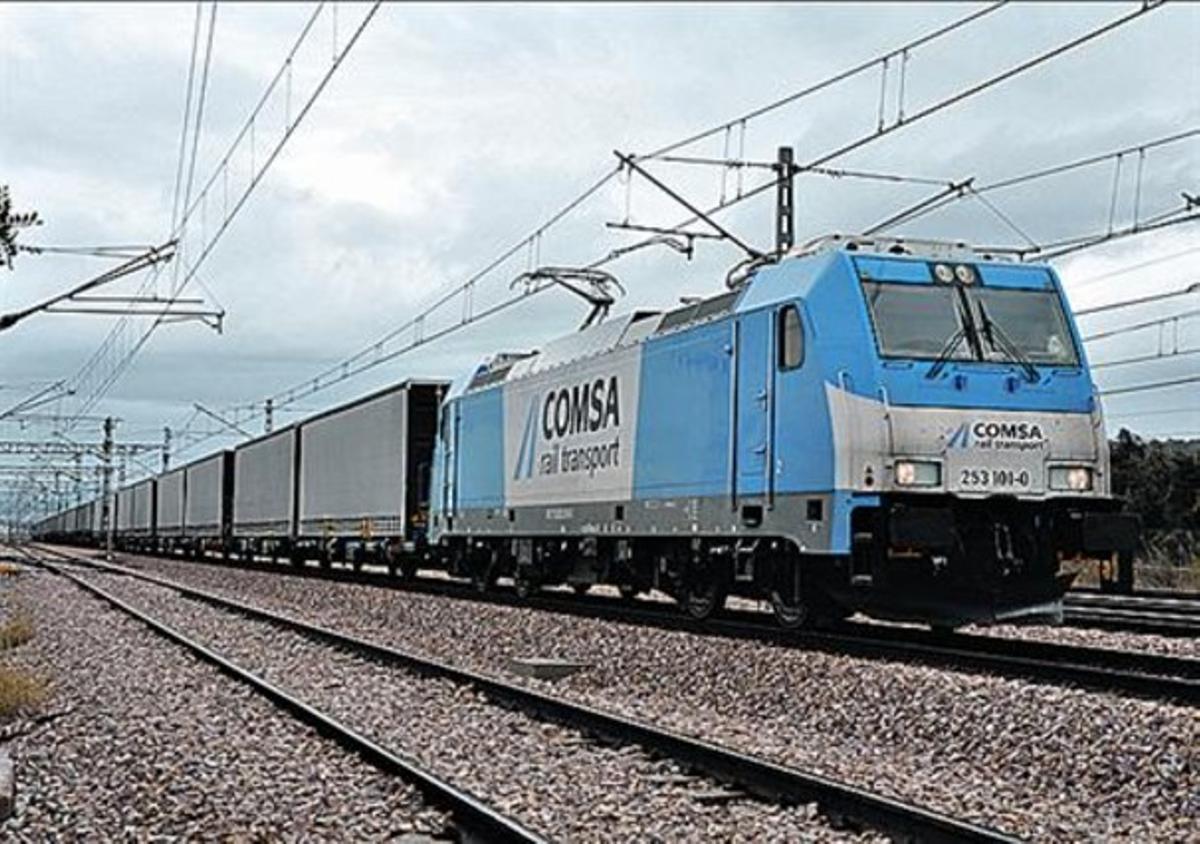 En marxa 8 Tren de la filial ferroviària de Comsa Emte. En marxa 8 Tren de la filial ferroviària de Comsa Emte.