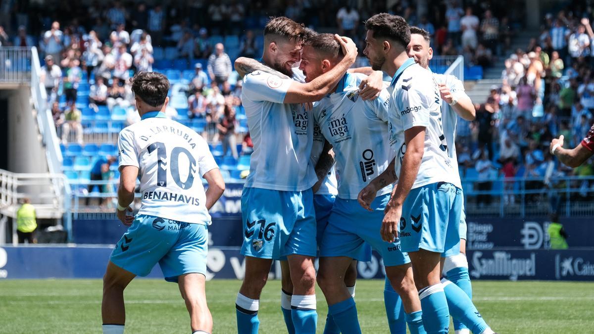 El Málaga CF celebra el gol del empate ante el Mérida.
