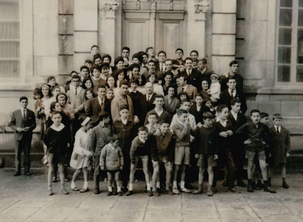 La fotografía antigua de los alfombristas.