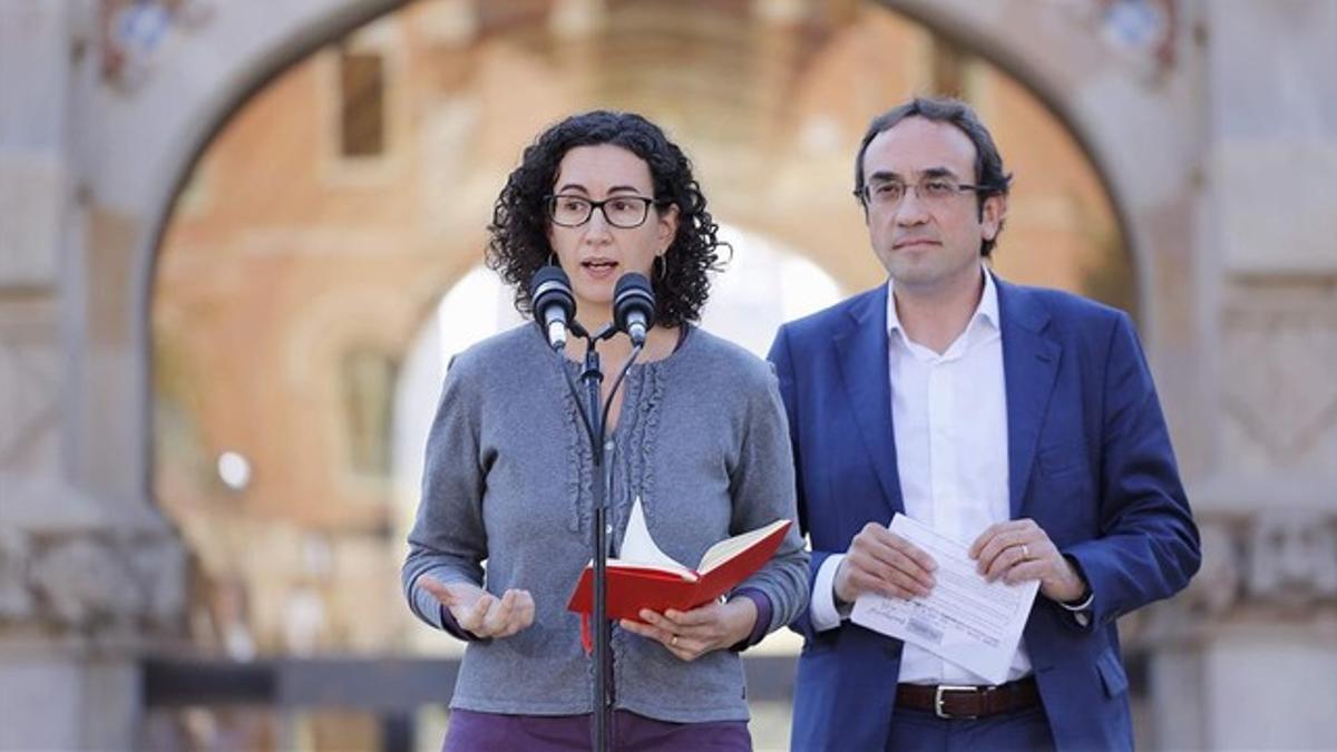 Marta Rovira y Josep Rull, este viernes, en la presentación de las listas de CDC y ERC para las generales.