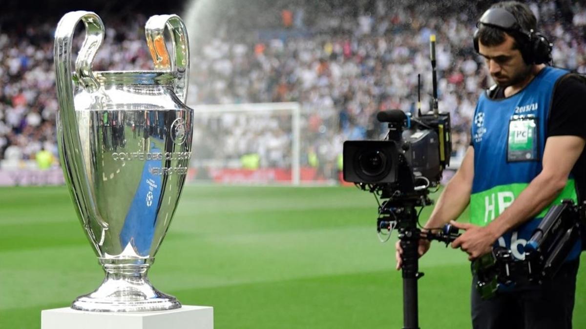 television tv cameraman takes images of the uefa champions league