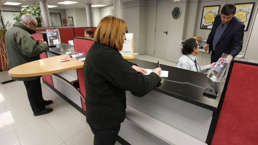 La banca culminará su ajuste con el cierre de hasta 5.000 oficinas más