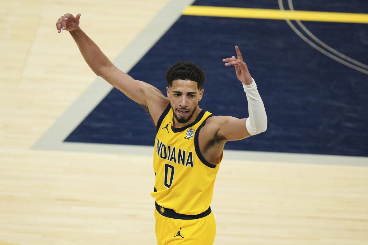 Indiana Pacers guard Tyrese Haliburton celebrates after a teammate made a 3-point basket during the second half of Game 6 of the Eastern Conference finals of the NBA basketball playoffs against the New York Knicks in Indianapolis, Saturday, May 31, 2025. (AP Photo/AJ Mast)