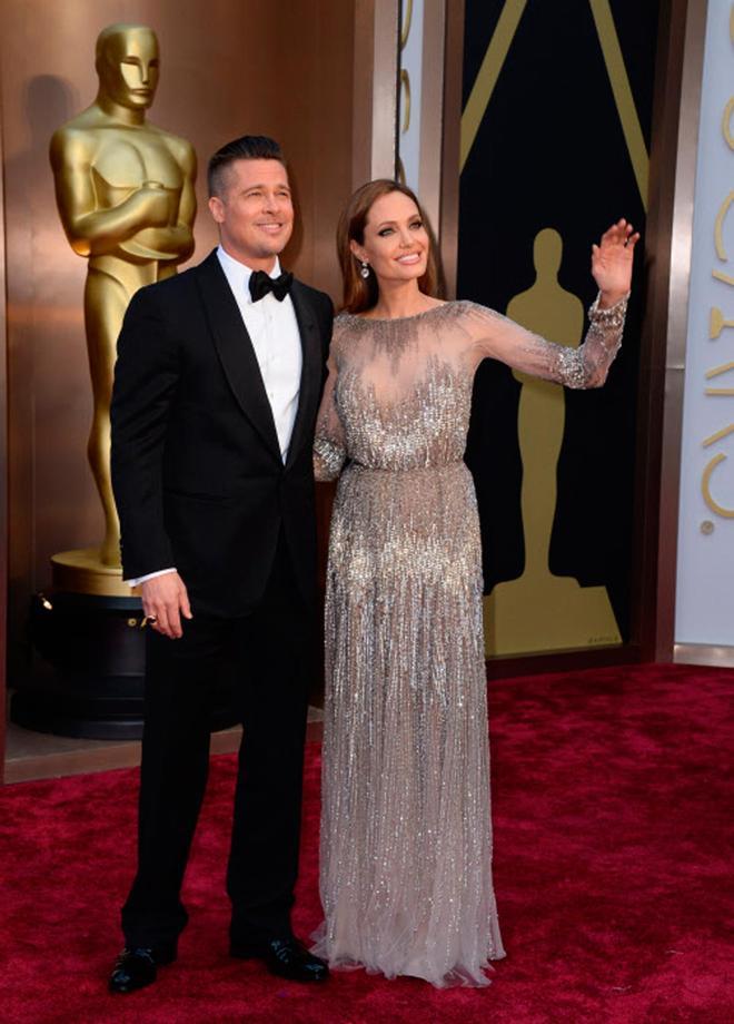 Brad Pitt y Angelina Jolie, con vestido joya de Elie Saab, en los Premios Oscar 2014