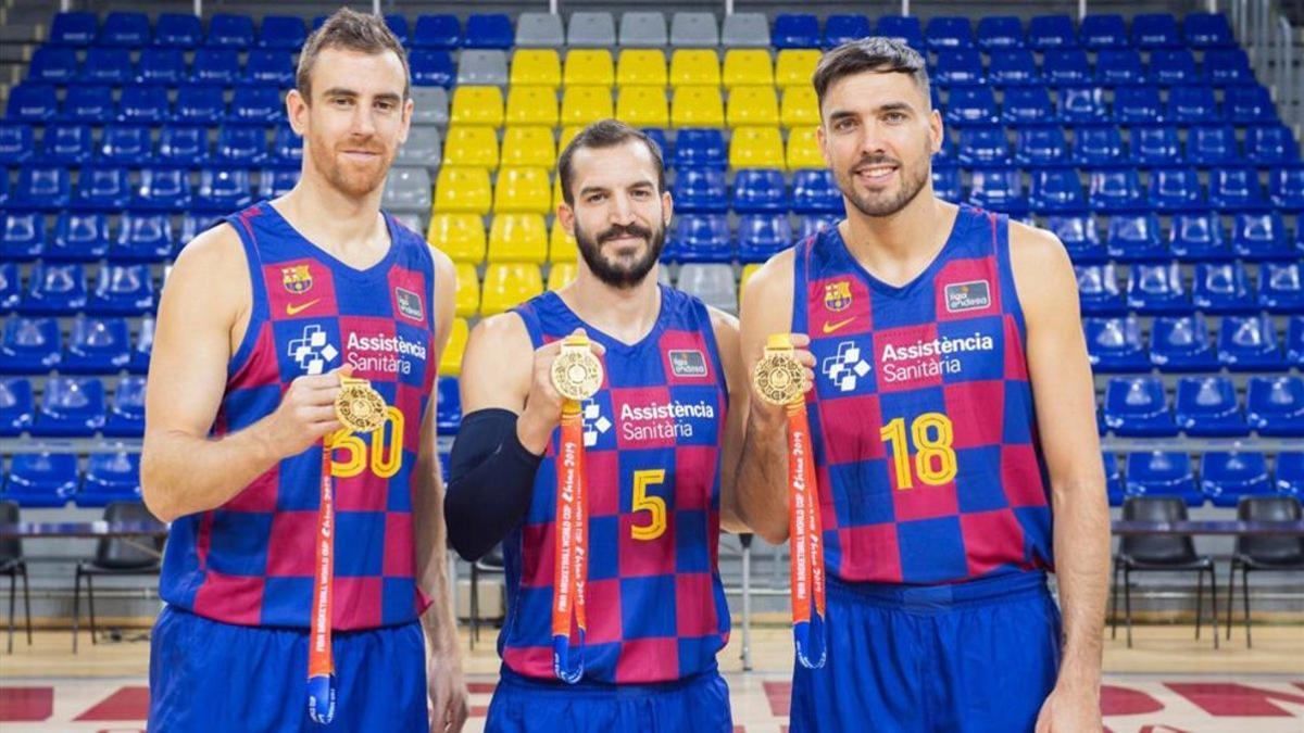 Claver, Ribas y Oriola, en el Palau con su medalla de oro