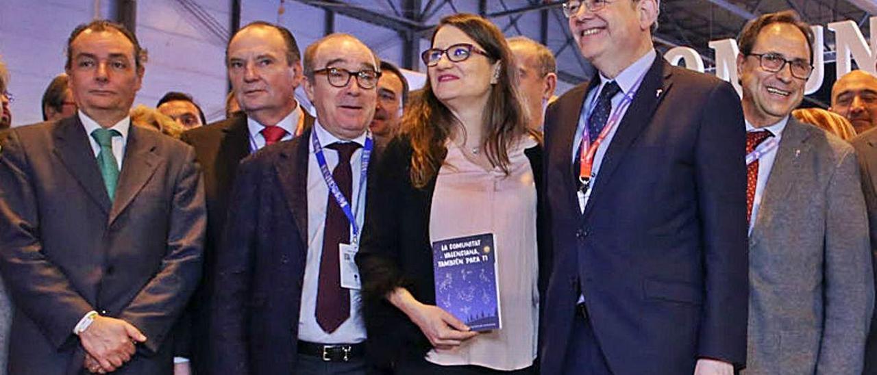 Toni Mayor y Mónica Oltra junto a Puig en una imagen reciente en una feria de turismo.