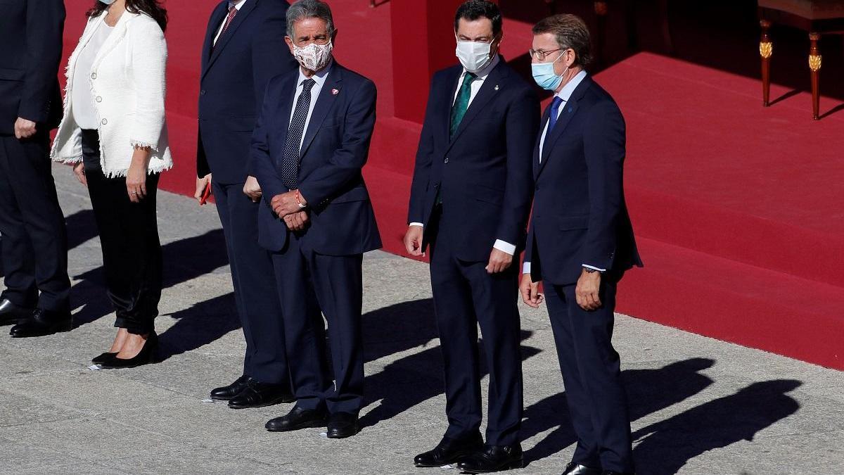 Juanma Moreno, durante el acto del Día de la Fiesta Nacional celebrado en el Palacio Real de Madrid.