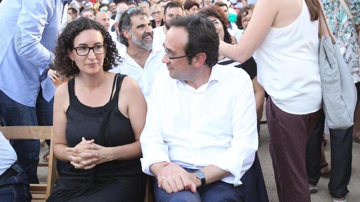 Marta Rovira (ERC) y Josep Rull (CDC), el miércoles en un acto de Junts pel Sí.