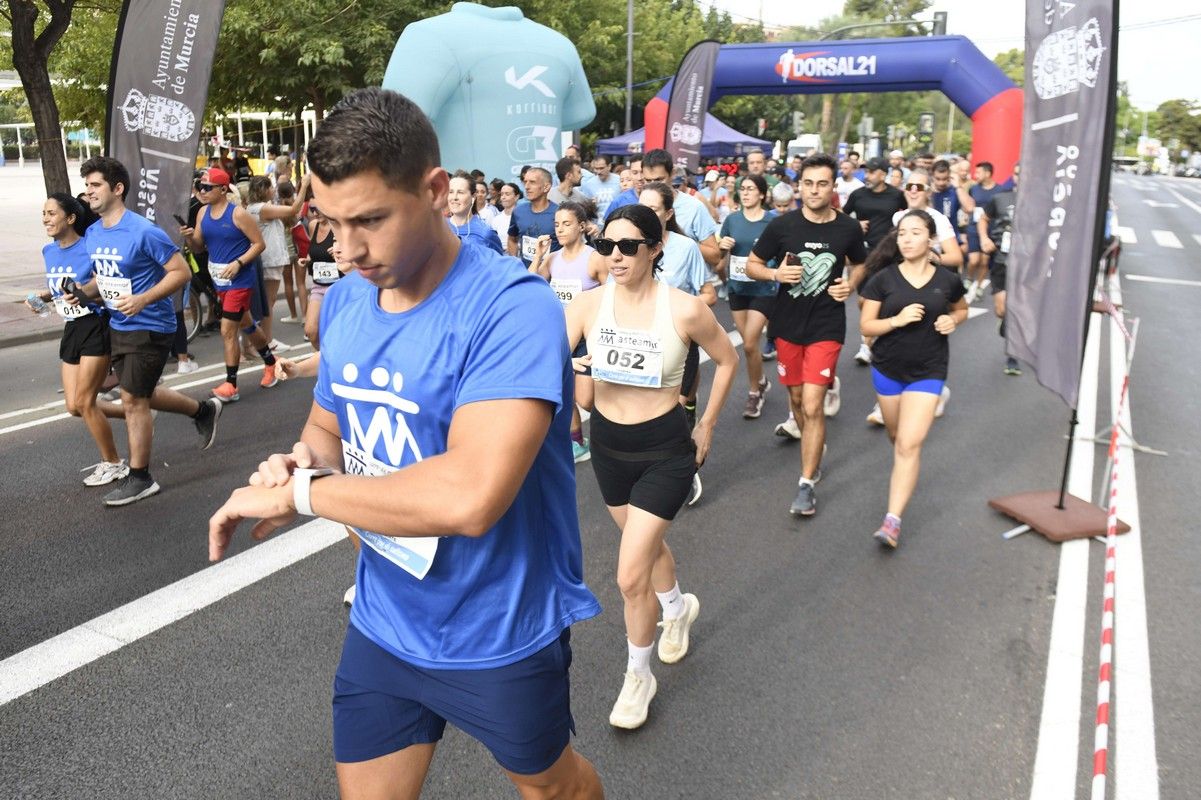 La carrera y marcha Solidaria Asteamur, en imágenes