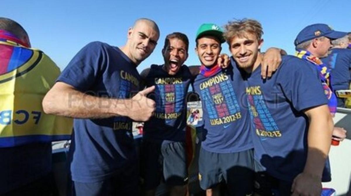 Valdés, Dos Santos, Thiago y Muniesa celebrando la Liga