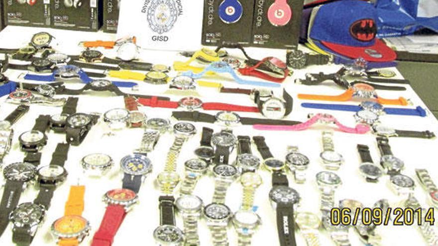 Siete imputados por vender relojes falsos