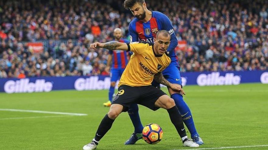 Sandro, junto a Piqué en el partido del Camp Nou