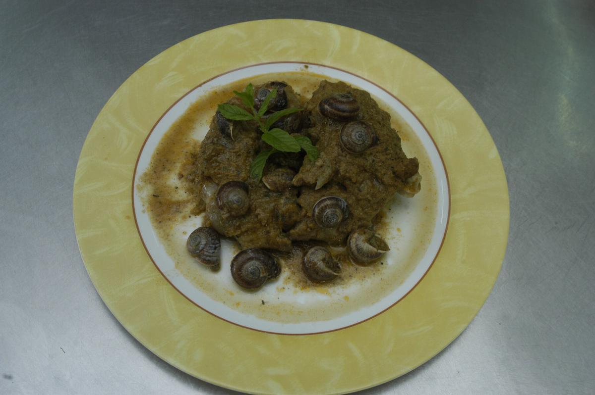 Peus de porc amb cargols.