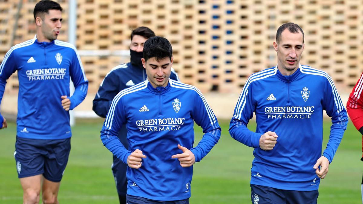 Jaume Grau y Petrovic, los dos pivotes defensivos, durante un entrenamiento.