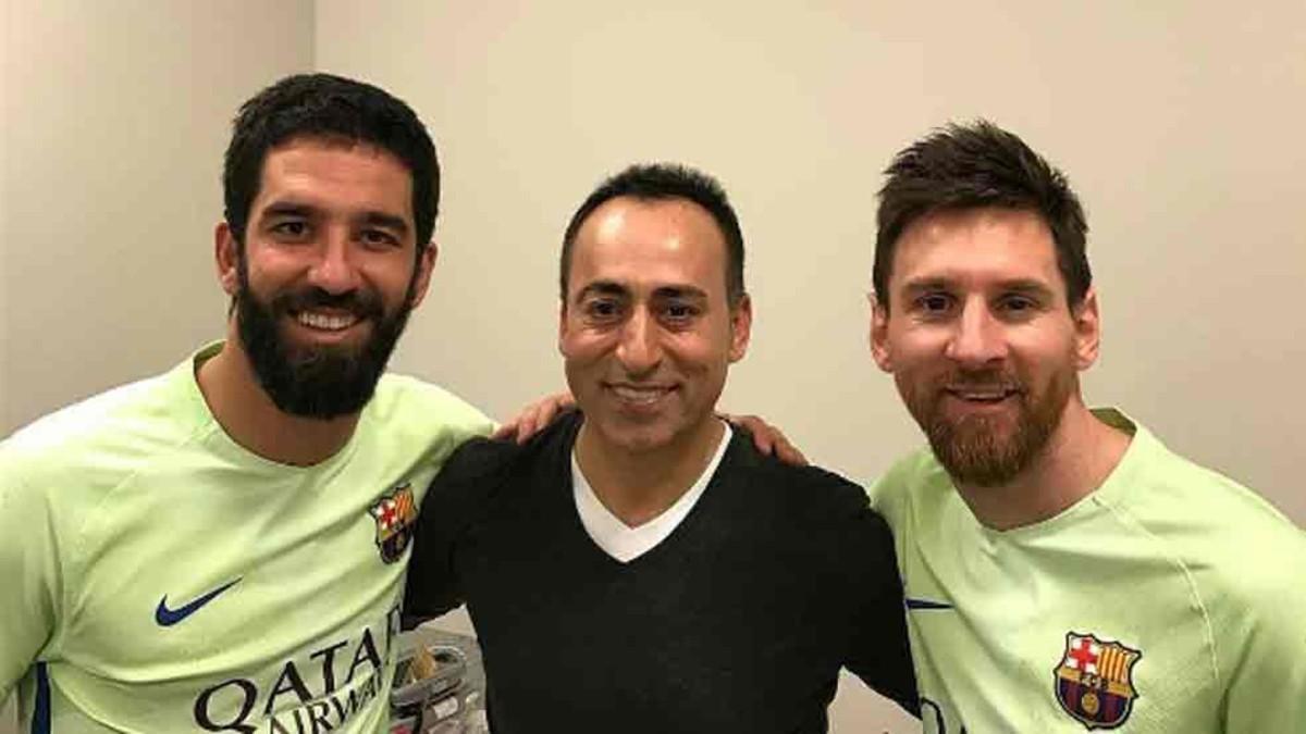 Lionel Messi and Arda Turan