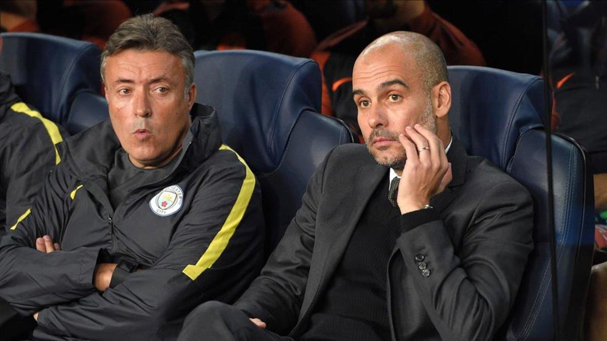 Torrent junto a Guardiola en el City