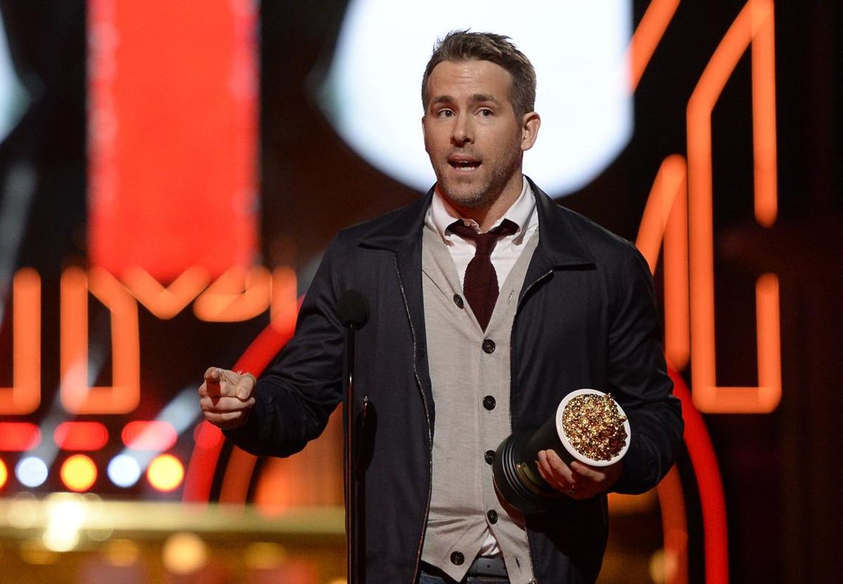 Ryan Reynolds accepts the award for best comedic performance for Deadpool at the MTV Movie Awards at Warner Bros. Studio on Saturday, April 9, 2016, in Burbank, Calif. (Kevork Djansezian/Pool Photo via AP)