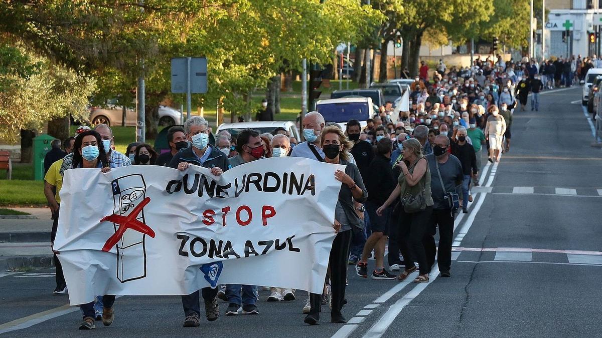 9 de septiembre del 2021. PAMPLONA. Vecinos de la Txantrea durante la manifestación convocada por TX Ekimena contra la implantación de la zona azul (ORA) en el barrio. FOTO DE Javier Bergasa / Diario de Noticias (POR FAVOR, FIRMARLA CON FOTOGRAFO Y DIARIO, QUE NOS LA HAN CEDIDO GRATIS Y NOS HAN PEDIDO ESO)