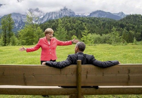 German Chancellor Merkel speaks with U.S. President Obama outside the Elmau castle in Kruen