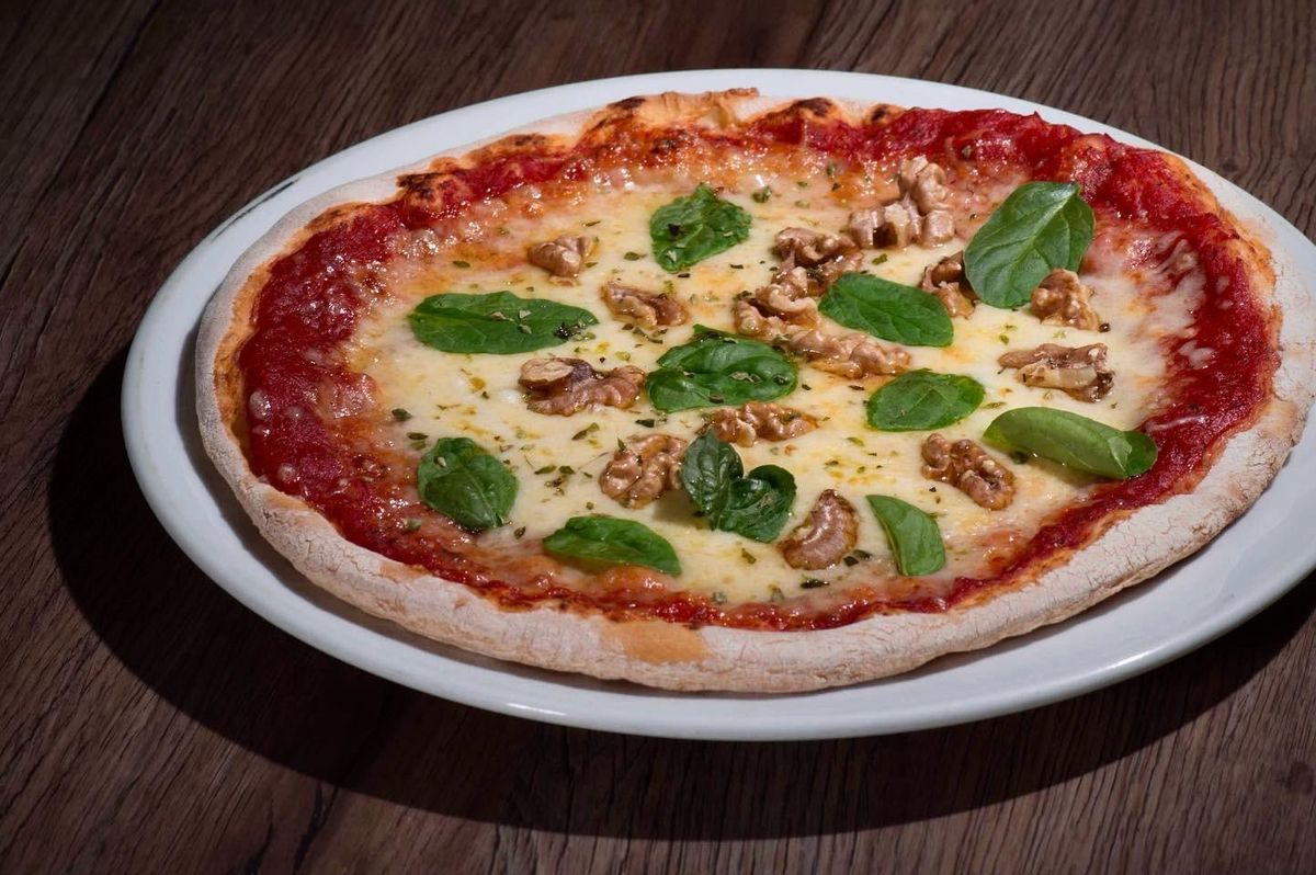 Pizza en el restaurante italiano El Patrón.