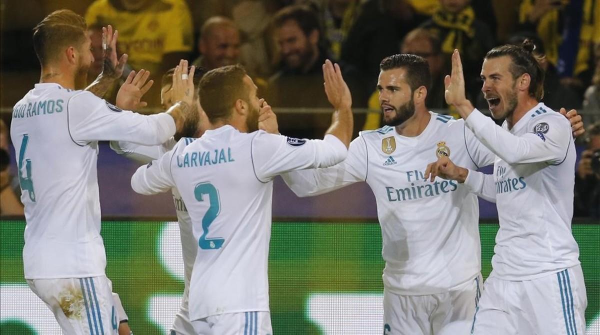 ecarrasco40297529 real madrid players celebrate with gareth bale  right  after170926211656