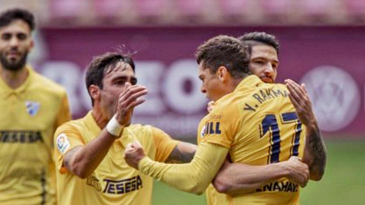 Yanis y Caye, junto a Escassi y Juande durante un encuentro la pasada temporada.