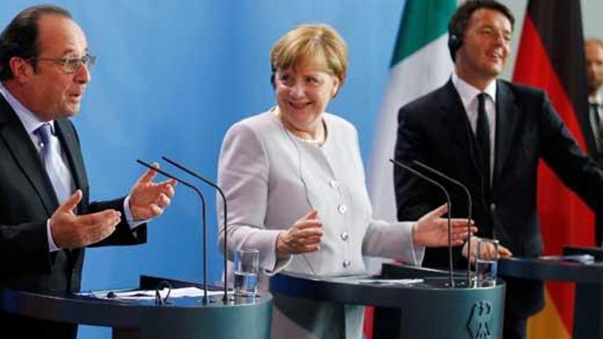 Hollande, Merkel y Renzi, en su rueda de prensa.