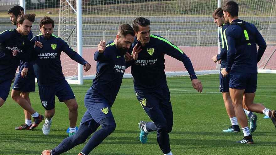 Cifu, junto a Luis Hernández, en un entrenamiento.