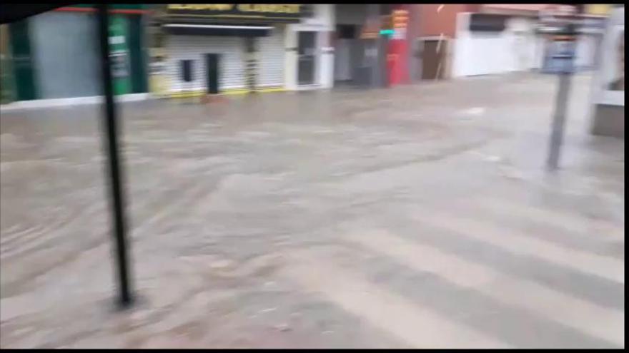 Calles anegadas por la lluvia en Campanillas y Puerto de la Torre
