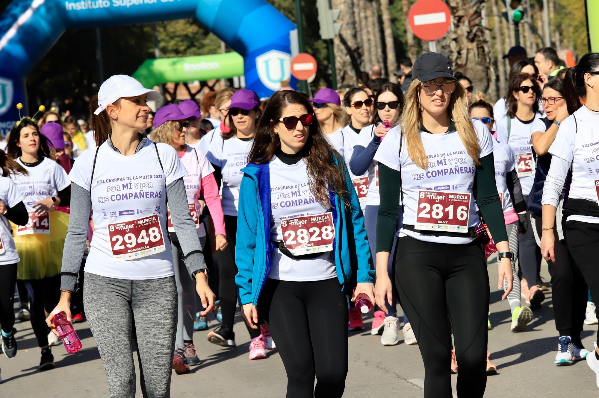 La salida y el recorrido de la Carrera de la Mujer 'inmortalizados' en imágenes