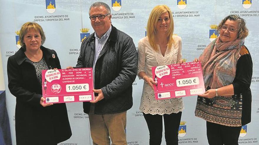 ORPESA ENTREGA 1.050 €  DE LA CAminata SOLIDARIA