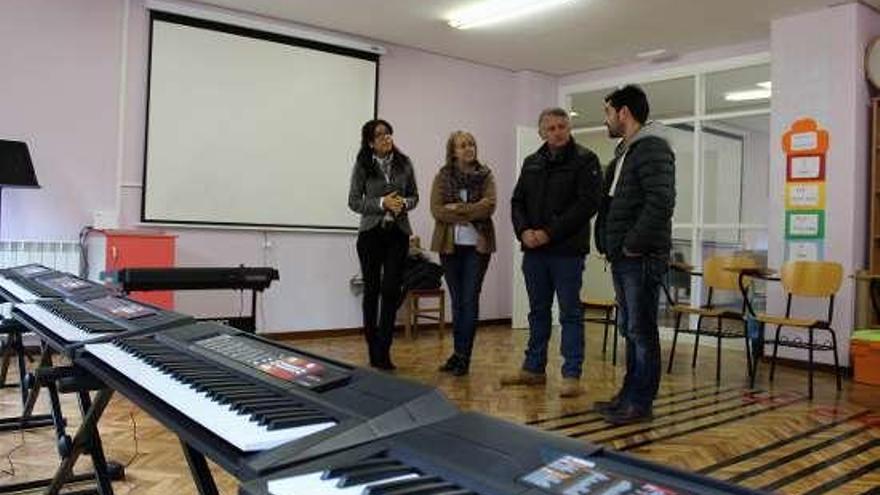 Costa, Crespo, Cuíña y Agulló, ayer, delante de los teclados.