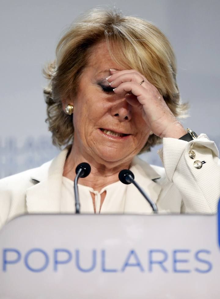 Aguirre, local candidate for ruling People's Party (PP), reacts as she delivers a speech at party's headquarters after the regional and municipal elections in Madrid