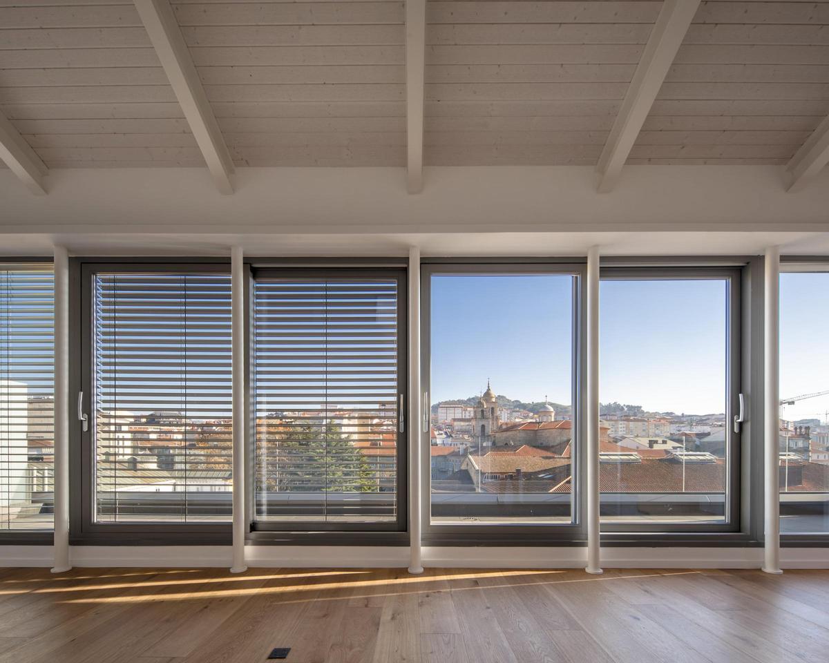 Rehabilitación y ampliación de edificio de viviendas en C/Progreso 57,59 (Vigo)