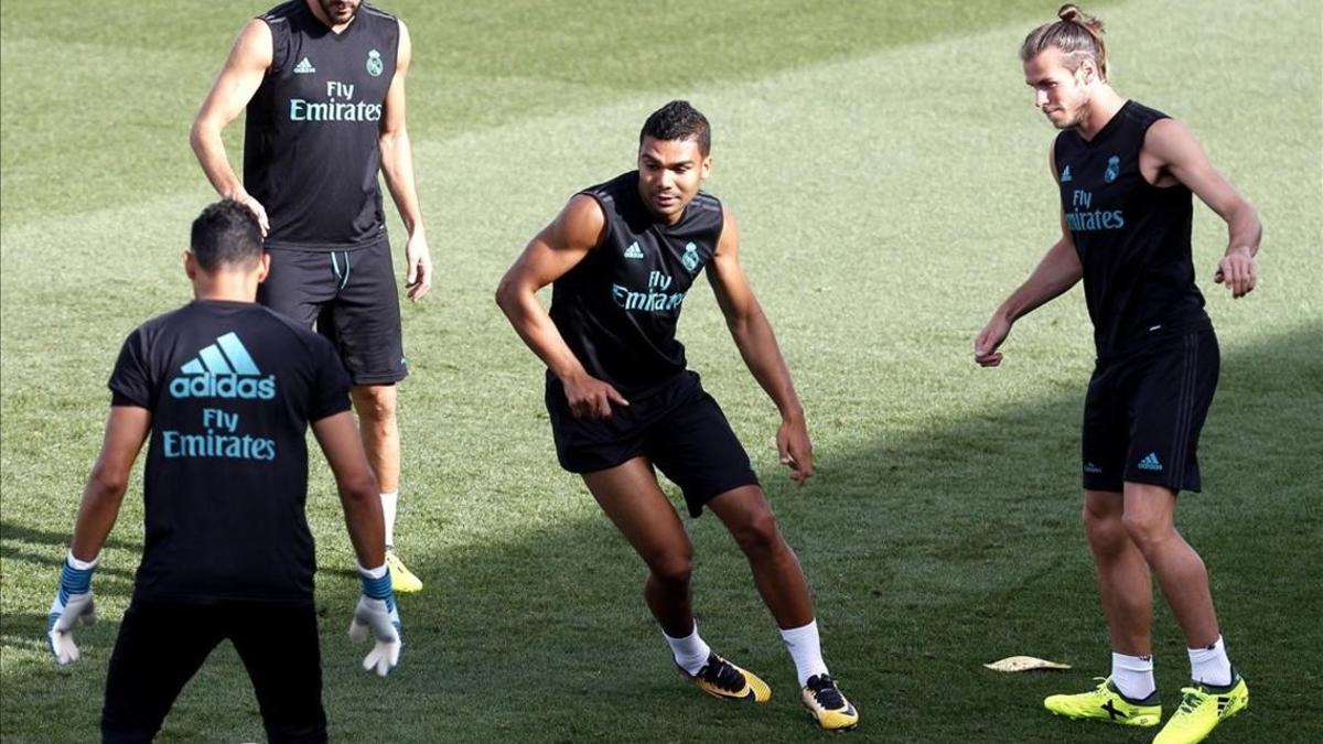 Casemiro, Bale, Benzema y Navas durante el entrenamiento de este sábado en Valdebebas