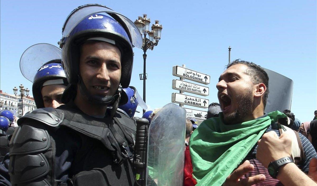 zentauroepp48147560 a student shouts next to riot police officer during an anti 190519163352