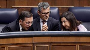 La ministra de Defensa, Margarita Robles, el de Exteriores, José Manuel Albares,  y el de Presidencia y Justicia, Félix Bolaños, durante la comparecencia de Pedro Sánchez en el Congreso. 