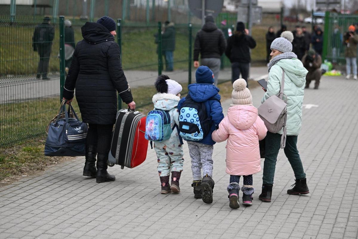 Refugiados ucranianos en la frontera con Polonia.