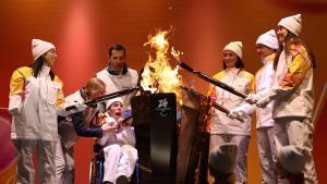 Ceremonia de unificación de la llama paralímpica, en Cortina.