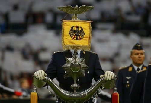 Military musicians perform before a friendly soccer match between Germany and Argentina in Duesseldorf