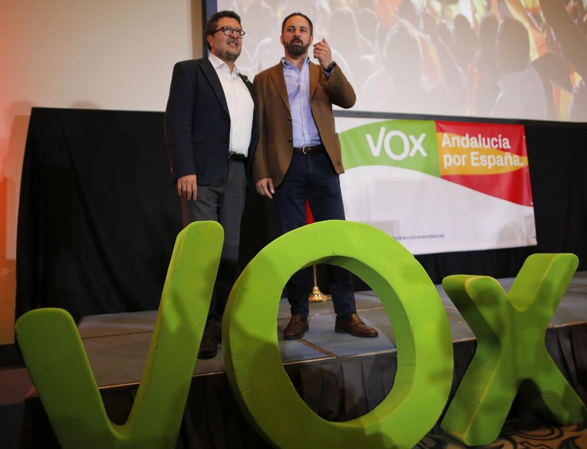 Spain’s far-right VOX  regional candidate Francisco Serrano is flanked by VOX party leader Santiago Abascal before a news conference following the Andalusian regional elections n Seville, Spain December 3, 2018. REUTERS/Jon Nazca