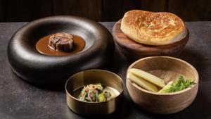 La ternera junto al pan roti paratha.