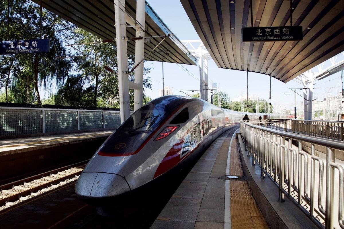 A G79 Fuxing bullet train  the first high-speed train service from Beijing West station to Hong Kong West Kowloon station following the opening of the Hong Kong section of the Guangzhou-Shenzhen-Hong Kong Express Rail Link  leaves the Beijing West Station in Beijing  China September 23  2018  REUTERS Stringer   ATTENTION EDITORS - THIS IMAGE WAS PROVIDED BY A THIRD PARTY  CHINAA OUT  NO COMMERCIAL OR EDITORIAL SALES INA CHINA