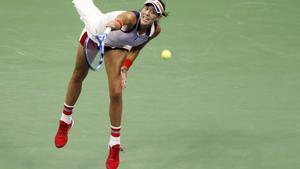 Garbine Muguruza, of Spain, serves against Petra Kvitova, of the Czech Republic, during the fourth round of the U.S. Open tennis tournament, Sunday, Sept. 3, 2017. (AP Photo/Adam Hunger)